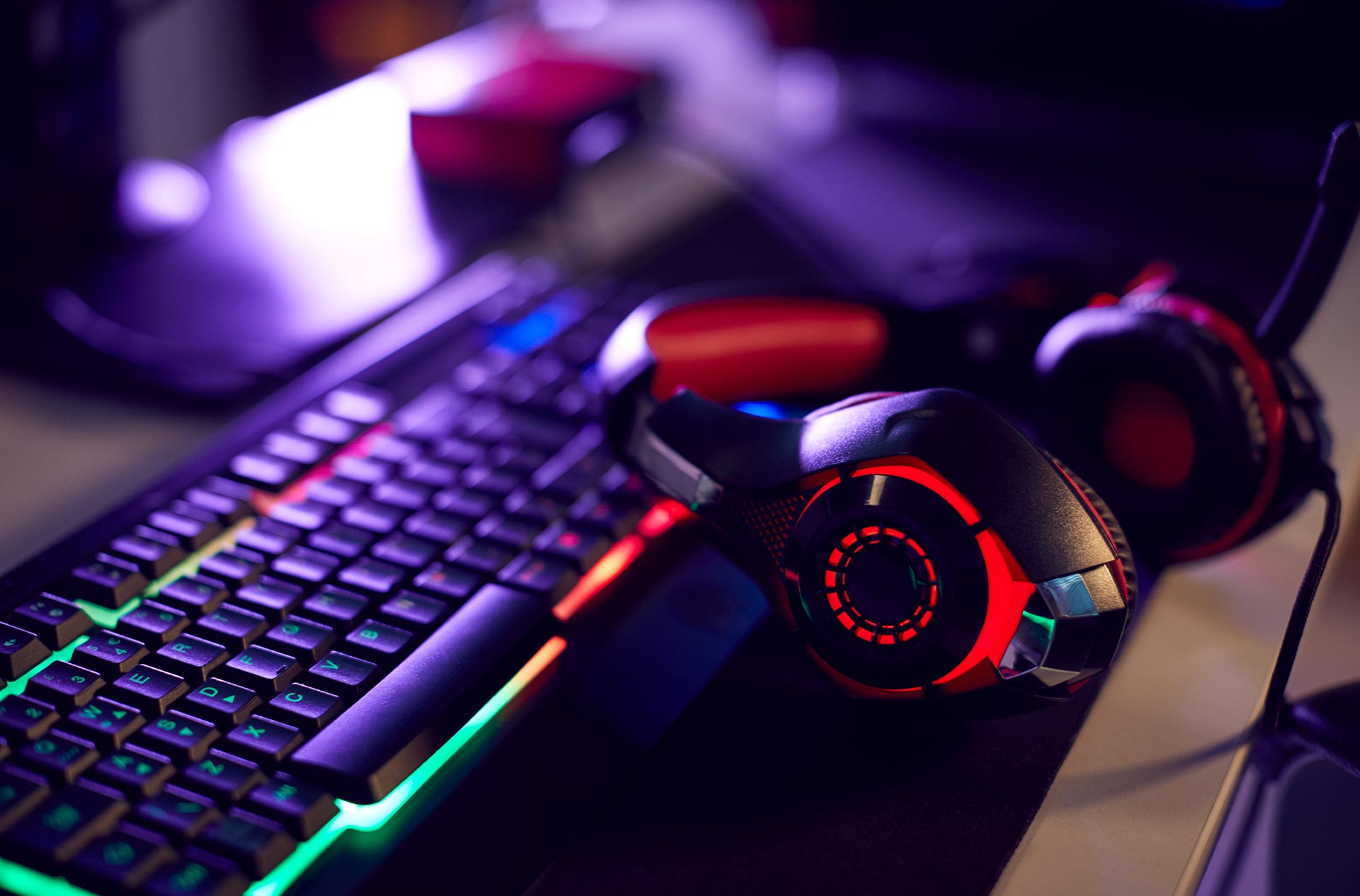 Image of a gaming keyboard and headset